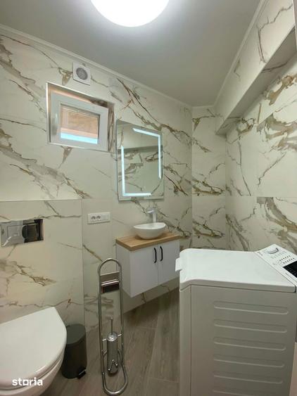 Apartament cu 3 camere semidecomandat în Micro 16
