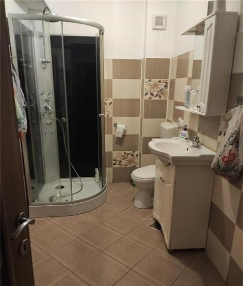 Apartament cu 2 camere semidecomandat, mobilat în Baciu