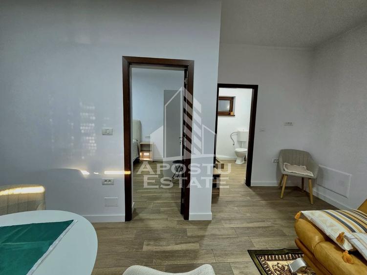 Apartament cu 2 camere semidecomandat, mobilat în Oșorhei