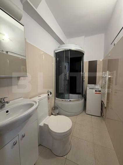 Apartament cu 2 camere semidecomandat, mobilat în Central