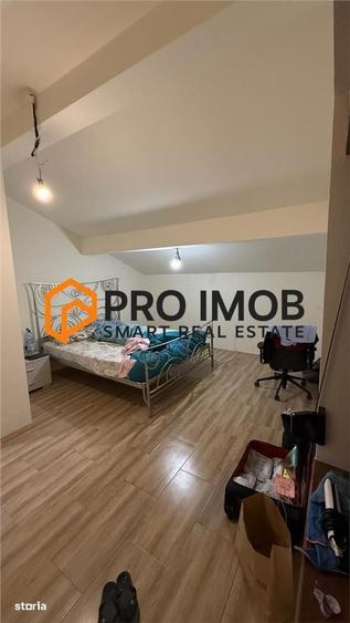 Casa tip P+M si garaj zona Spataru - Costesti - 6
