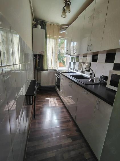 Apartament 2 camere zona Dambovita amenajat mobilat utilat centrala proprie - 1