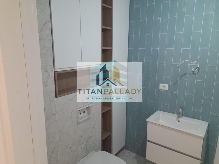 Apartament cu 4 camere decomandat în Titan