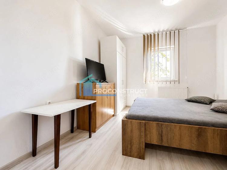 Apartament cu 3 camere semidecomandat în Buziașului