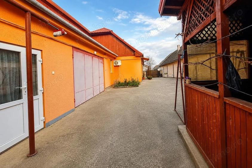 Casă cu Teren 1348 Mp în Giarmata