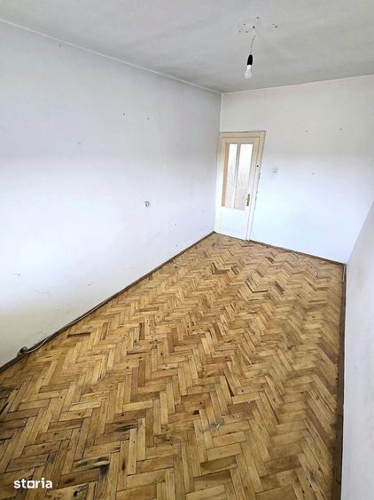 Casă cu 4 camere cu Teren 420 Mp în Titulescu