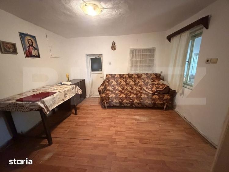 Casă cu 3 camere cu Teren 1400 Mp în Nușfalău