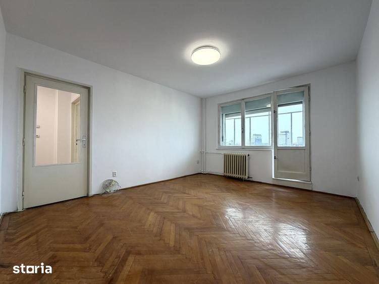 Apartament cu 3 camere semidecomandat în Punctele Cardinale