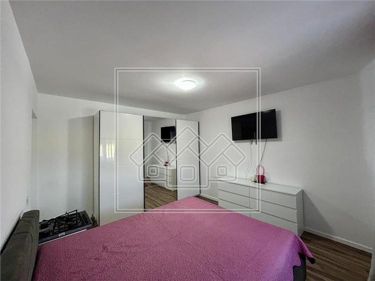 Apartament cu 2 camere, decomandat + balcon, 2 locuri de parcare - 9
