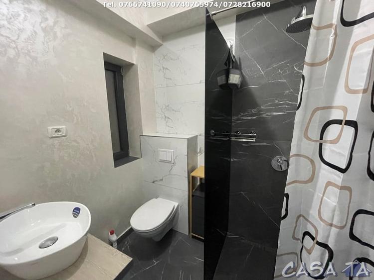 Apartament cu 2 camere semidecomandat, mobilat în Central