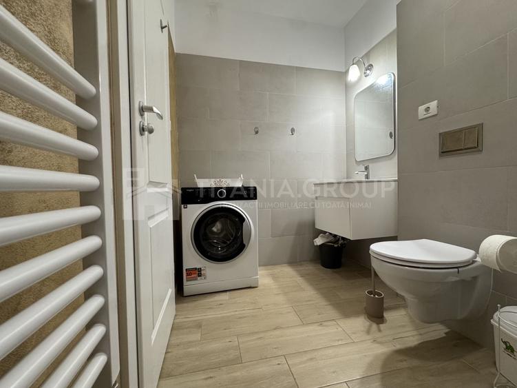 Apartament cu 2 camere semidecomandat, mobilat în Tractorul
