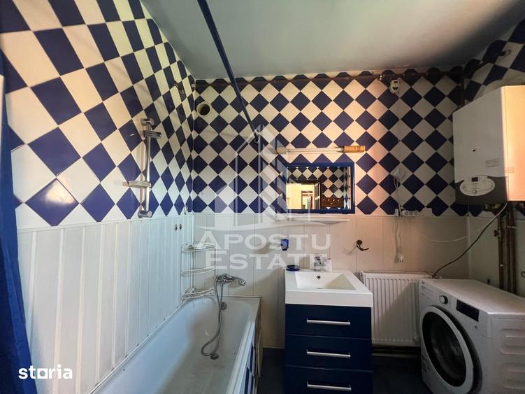 Apartament cu 2 camere semidecomandat în Ronaț