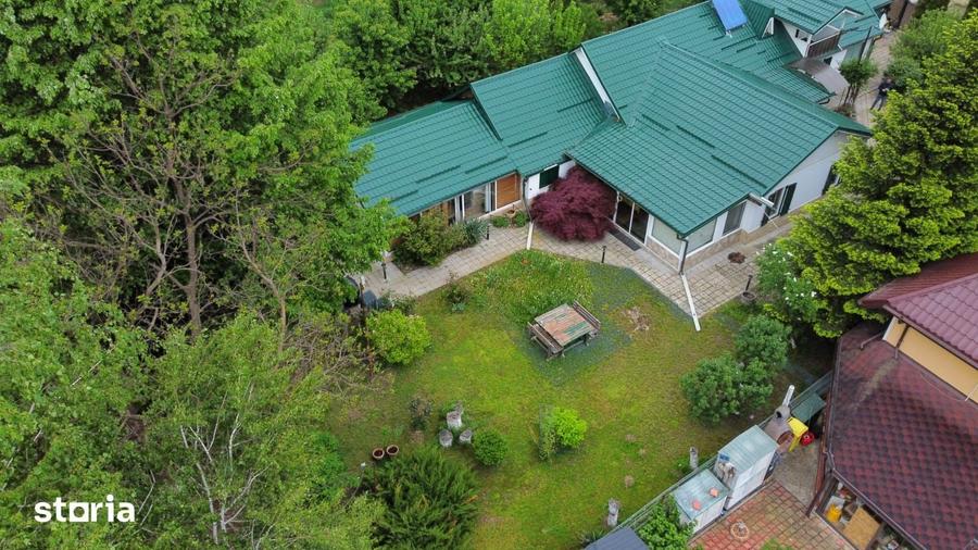 Casă cu 8 camere cu Teren 1000 Mp în Gârleni