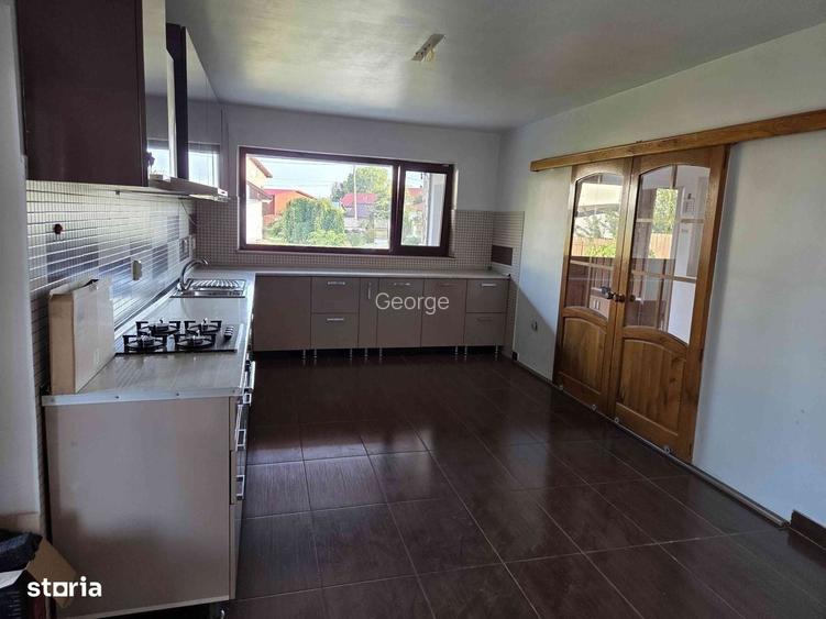 Casa cu 5 camere si garaj, teren 1400 mp