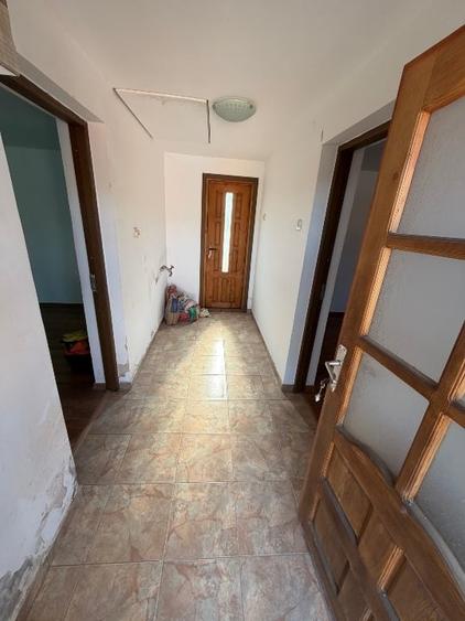 Casă individuală cu 2 camere cu Teren 1400 Mp în Răcoasa