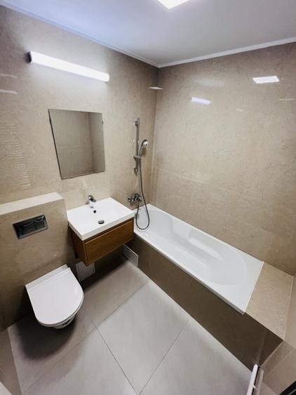 Apartament cu 2 camere semidecomandat, mobilat în Tei