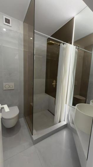 vanzare apartament 3 camere Cortina North parcare  si boxe - 10
