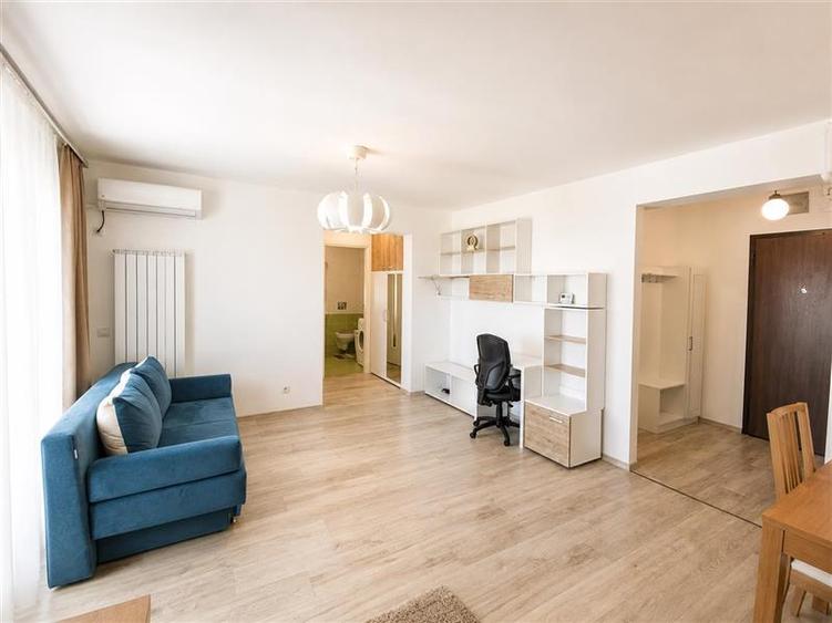 Apartament cu 2 camere semidecomandat, mobilat în Tractorul