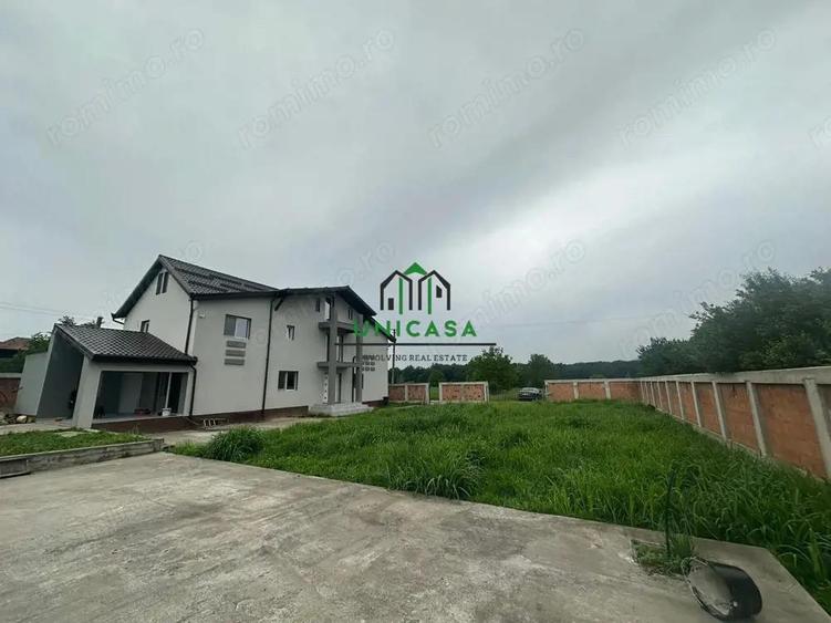 Casă cu Teren 2000 Mp în Români