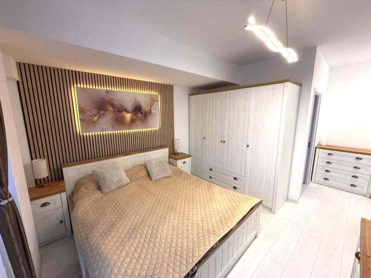 Apartament cu 3 camere semidecomandat, mobilat în Otopeni