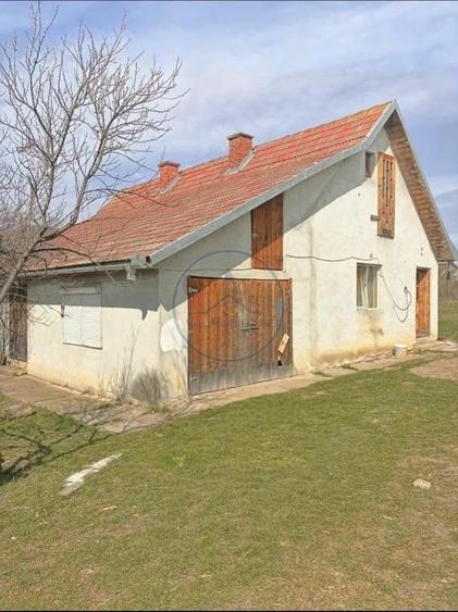 Casă cu Teren 700 Mp în Central