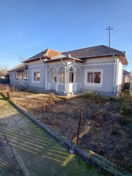 Casă cu 4 camere în Mârzănești