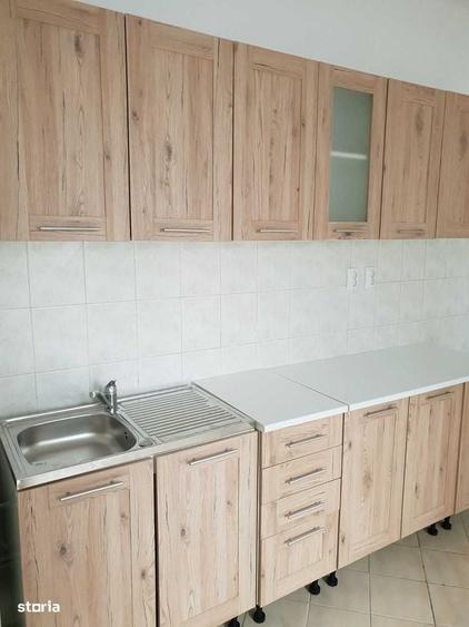 Apartament cu 3 camere în Romană