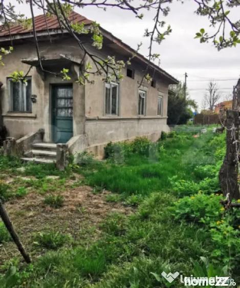 Casă cu 3 camere cu Teren 1500 Mp în Central