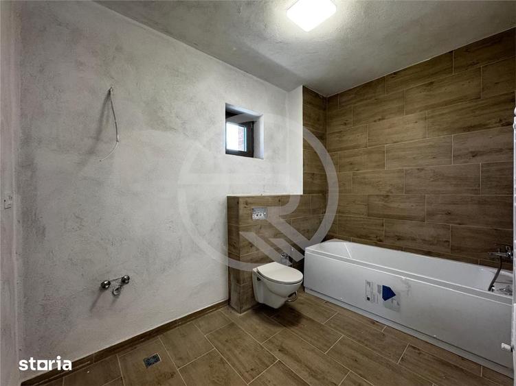 Apartament cu 3 camere semidecomandat în Borhanci