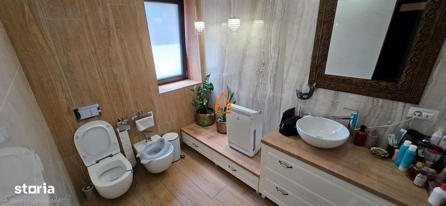 Casă cu 4 camere în Bucium