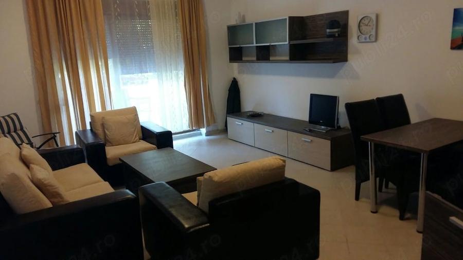 Apartament cu 2 camere semidecomandat, mobilat în Central