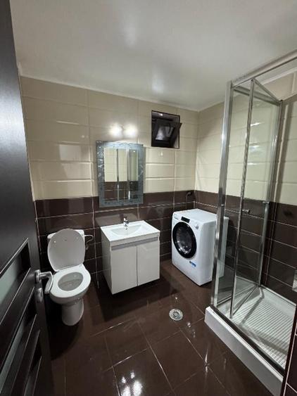 Casă cu 5 camere cu Garaj în Central