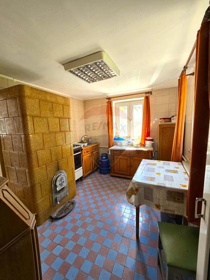 Casă cu 5 camere cu Teren 500 Mp în Moieciu