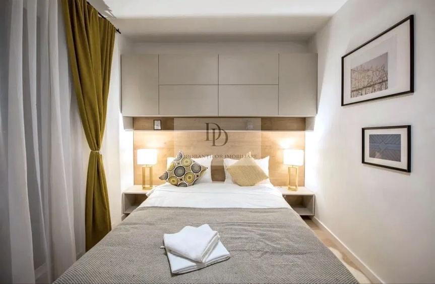 Apartament cu 3 camere semidecomandat, mobilat în Central