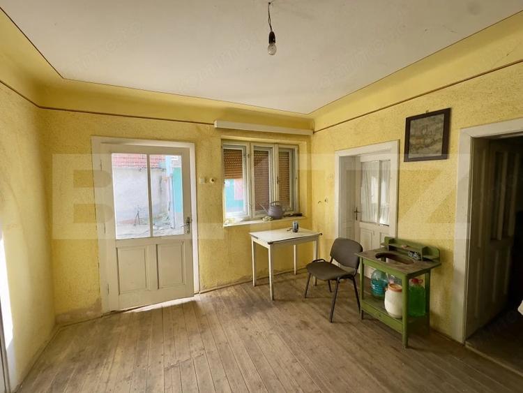 Casă cu Teren 1220 Mp în Central
