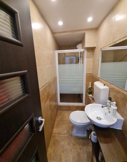 Apartament cu 4 camere decomandat în Tractorul