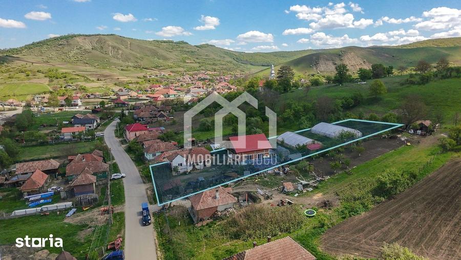 Casă cu 5 camere cu Teren 1974 Mp în Jucu