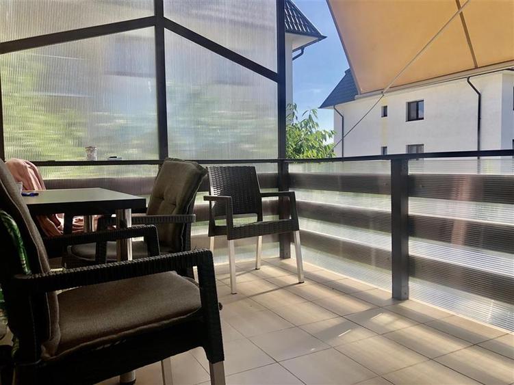 Apartament cu 3 camere decomandat în Tractorul