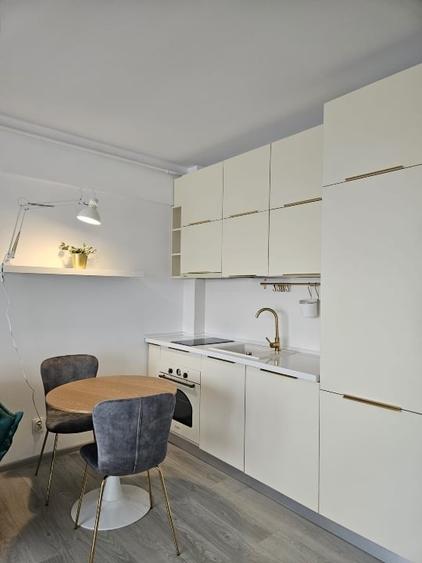 Apartament cu 2 camere semidecomandat, mobilat în Eremia