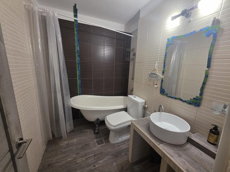 Apartament cu 2 camere semidecomandat, mobilat în Central