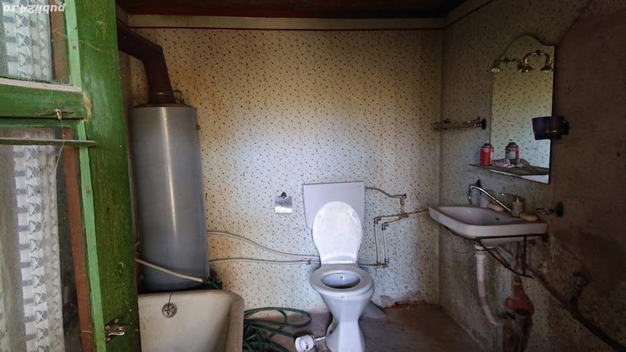 Casă cu 2 camere cu Teren 934 Mp în Tisa