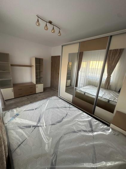 Apartament cu 3 camere decomandat în Bucium