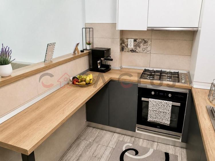Apartament cu 2 camere semidecomandat, mobilat în Baciu