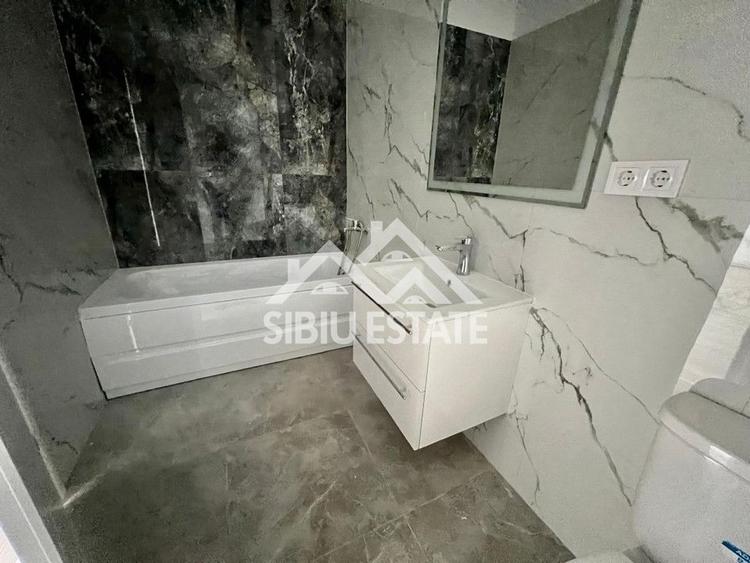 Apartament cu 2 camere decomandat în Șelimbăr — fotografia 2