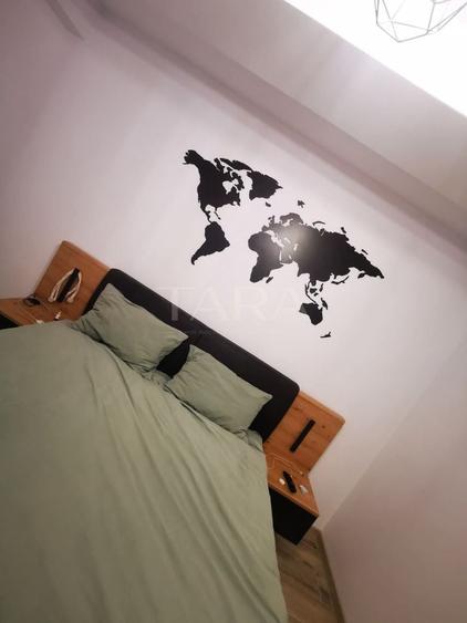 Apartament cu 2 camere semidecomandat, mobilat în Baciu