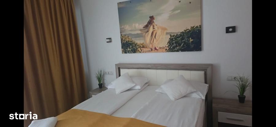 Casă cu 7 camere cu Teren 1500 Mp în Sânmartin