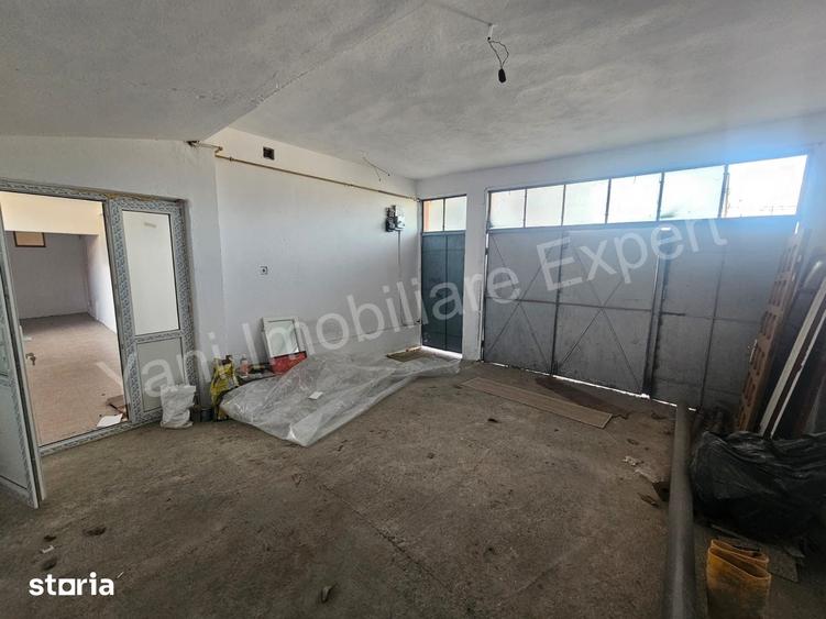 Casă cu 8 camere cu Teren 1500 Mp în Central