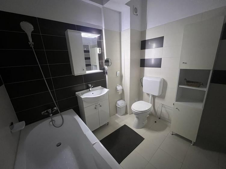 Proprietar inchiriez apartament cu 3 camere, 2 dormitoare, 2 bai, loc parcare, centrala, AC, balcon, camera dresing - 4