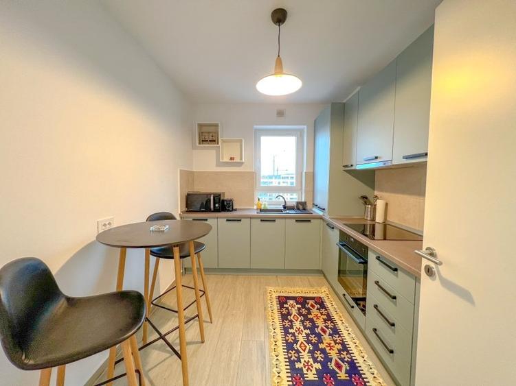 Apartament cu 2 camere semidecomandat, mobilat în Tractorul — fotografia 3