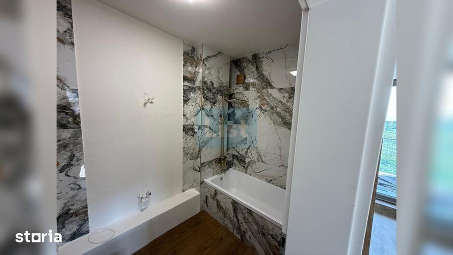 Apartament cu 3 camere semidecomandat în Borhanci